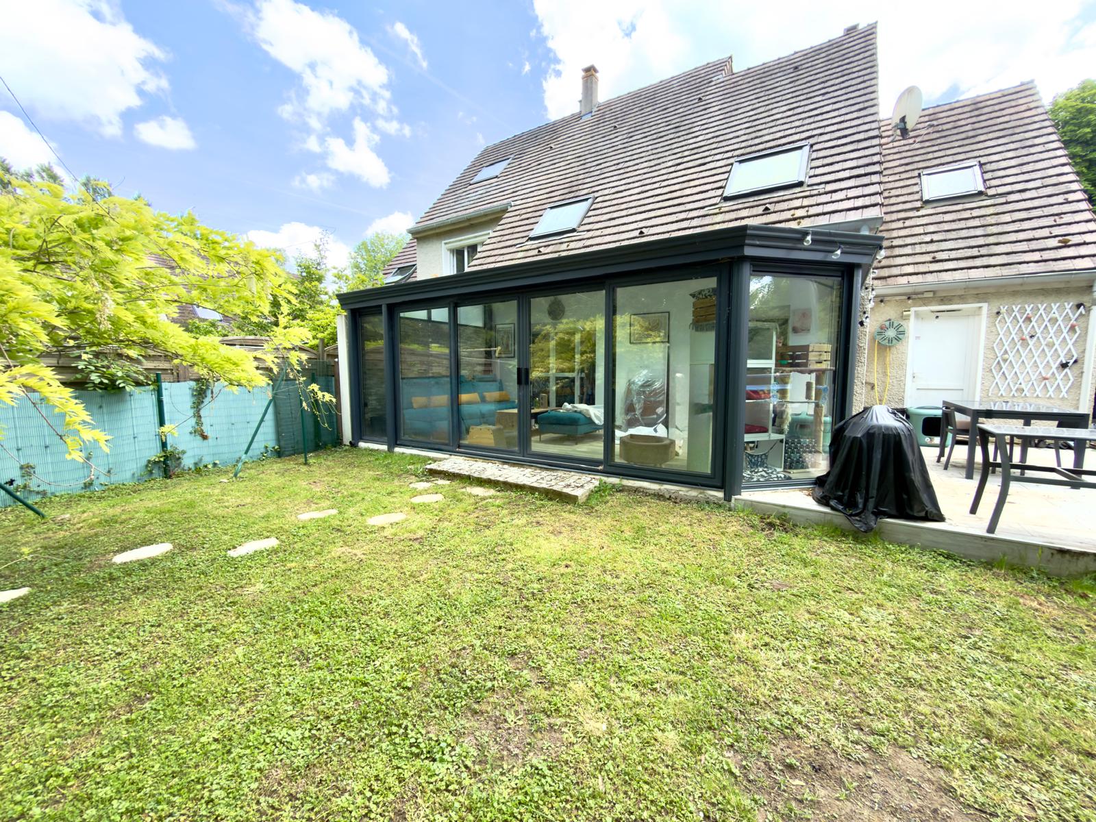 A warm and inviting family home set in lush, verdant surroundings