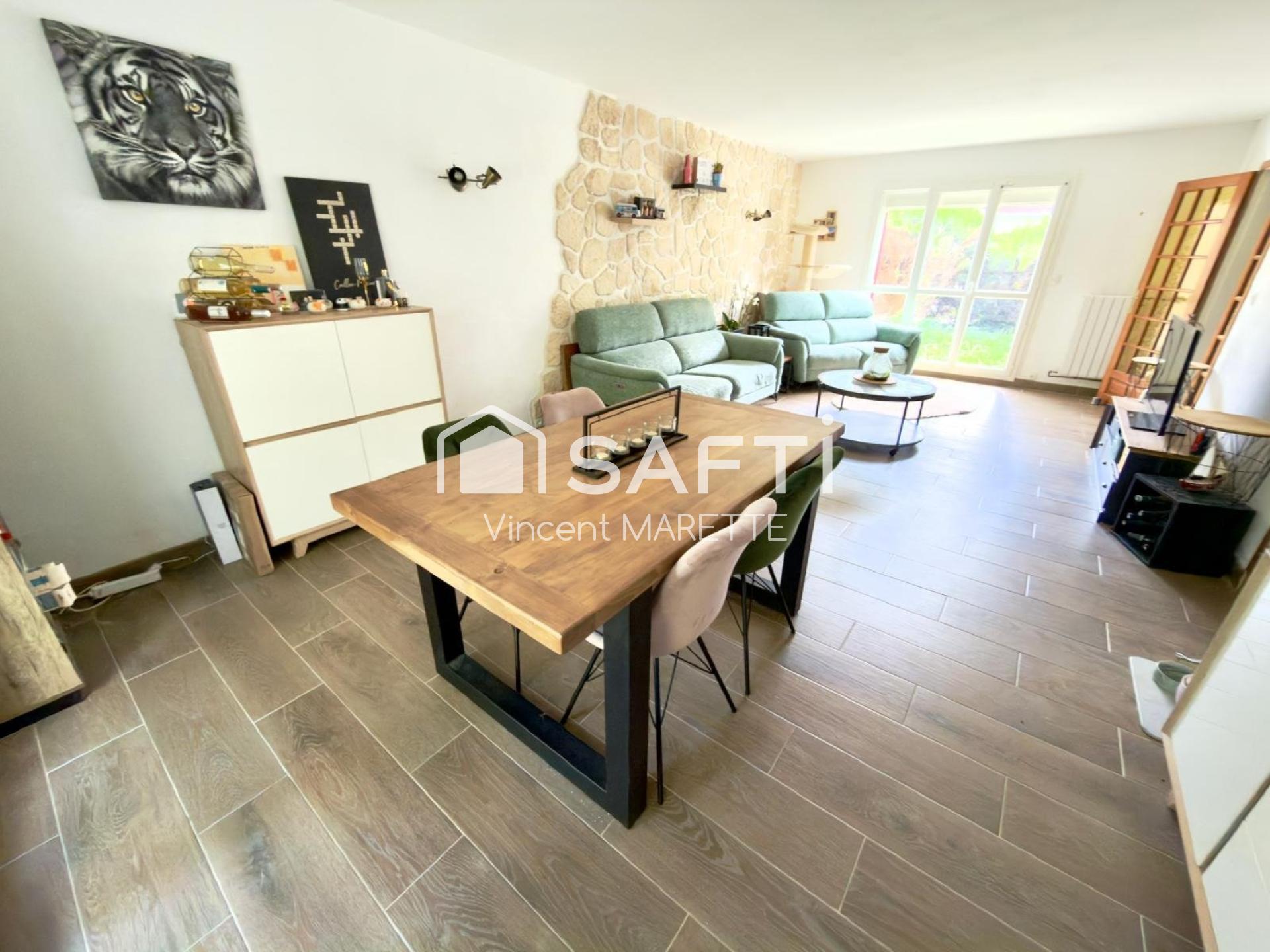 Maison familiale avec piscine et véranda dans un cadre verdoyant